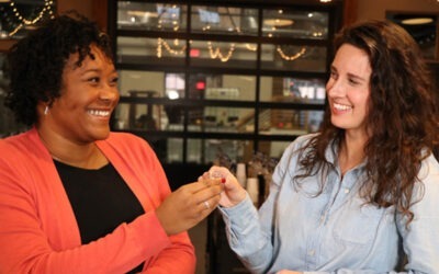 two women share a tasting at McClintock Distilling